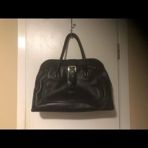 TOD’S soft leather handbag.